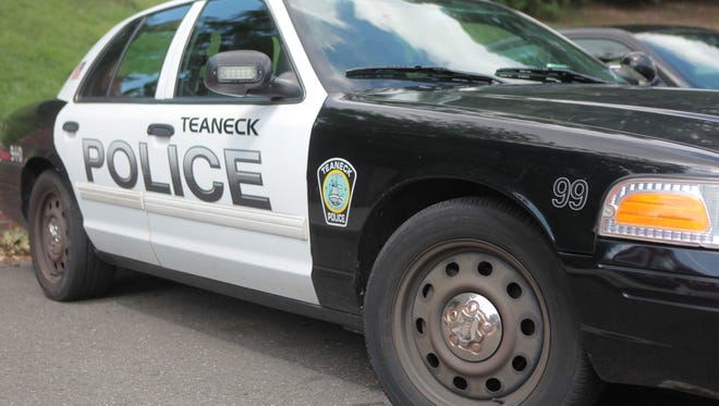 Teaneck Police car and town crest