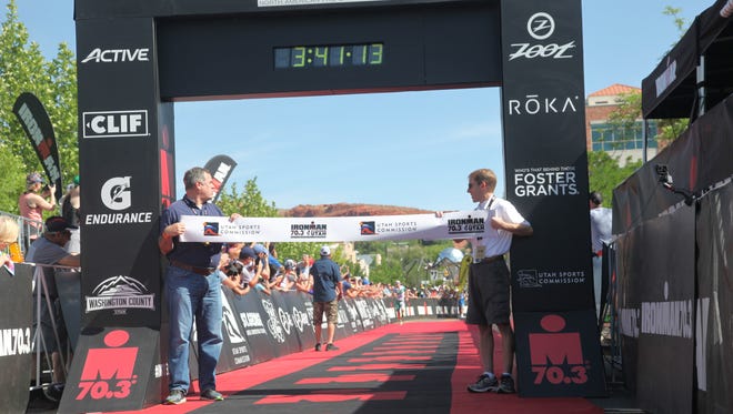The IRONMAN 70.3 St. George finish line, where participants with prosthetics prove they're more than their disability.