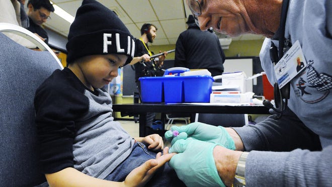 There is a debate over what threshold of lead levels in children's blood should be considered "lead poisoning" in the wake of the Flint water crisis.