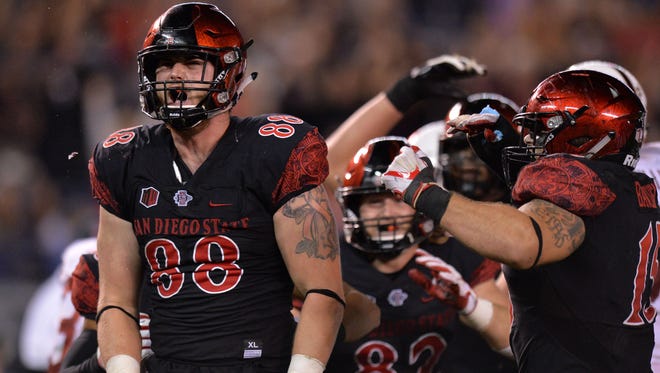 SDSU David Wells reacts after scoring the go-ahead touchdown during a win over Stanford.