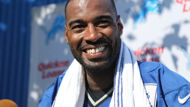 Lions wide receiver Calvin Johnson talks with reporters at training camp in 2015 at the practice facility in Allen Park.