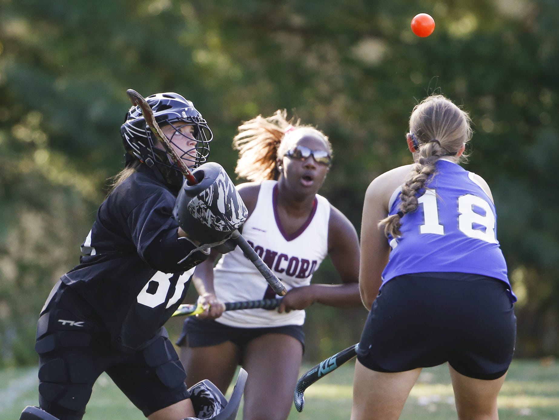 Middletown goalie Lauren Berry (left) and teammate Hannah Harmon (18) follow the flight of the ball with Concord's Arnise King in the second half of Concord's 1-0 win Wednesday.