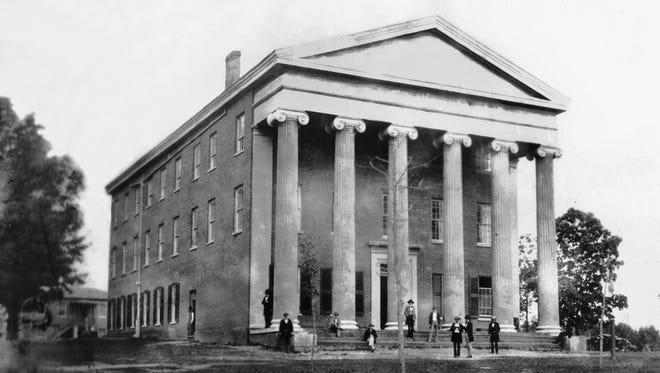 The Lyceum Building at the University of Mississippi, in a photograph dating to about 1860, is of stately Ionic Greek Revival design and made of bricks thought to have been made from clay at the site. Construction began on July 14, 1846, and was completed in 1848, with additions in 1858, 1903 and 1923. The entire building was renovated from 1998-2000 and remains the sole survivor of the five original buildings and it has remained the principal administration building.