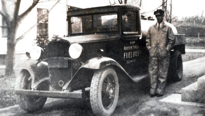 A driver with Main Care Energy poses next to his delivery truck in this undated photo. The Albany, N.Y.-based dealership has served western Vermont for decades and is a member of the Vermont Fuel Dealers Association.