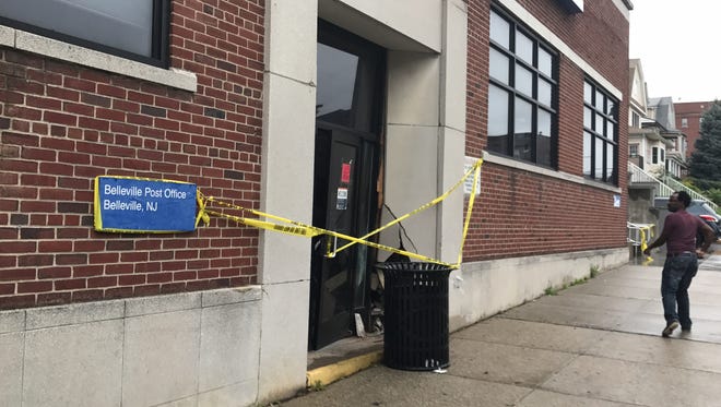 Police have blocked off an unstable entry to the Belleville Post Office on Washington Street following a two-car crash there on Tuesday, Aug. 29, 2017.