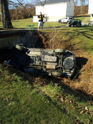 Vehicle rolls down an embankment on Indian Rock Dam Road, York Township.