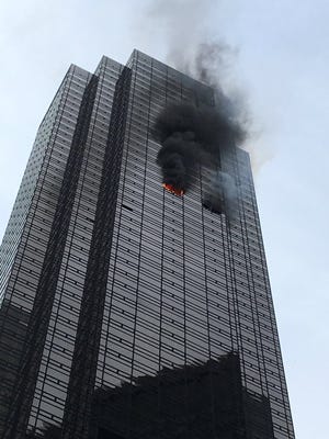 Lalitha Masson had a decision to make when a blaze broke out Saturday at Trump Tower in New York City. She and her husband live on the 36th floor.