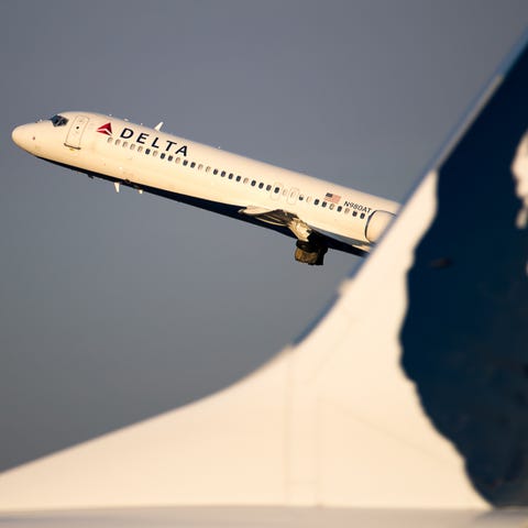 A Delta Air Lines Boeing 717 takes off from...