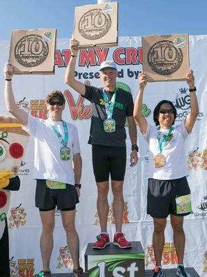 Howard Kanner, center, was the winner of the 2015 Pizza Delivery Challenge of the Eat My Crust 5K. Second place was Harry Prosser, left, and third was Joel Remigio.