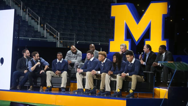 Michigan recruits, former players and coaches answer questions for fans during the Signing of the Stars event at the Crisler Center in Ann Arbor on Wednesday, Feb. 1, 2017.