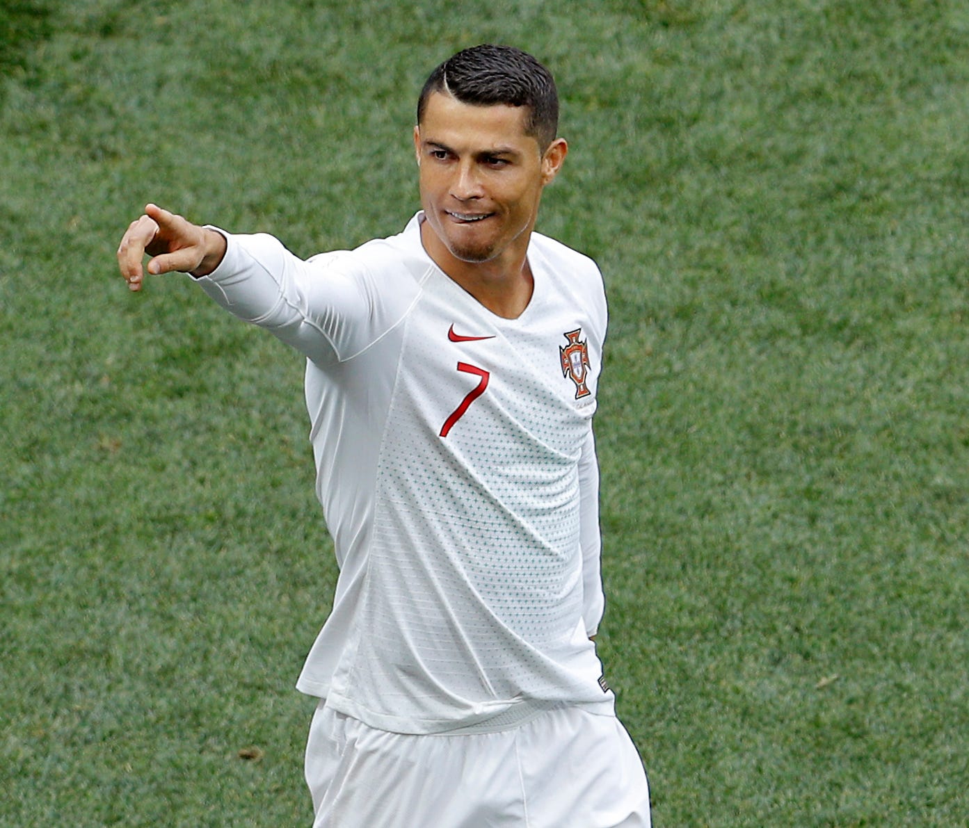 Portugal's Cristiano Ronaldo celebrates after scoring the opening goal against Morocco.