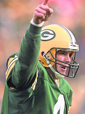 Brett Favre celebrates a two-point conversion as the Packers' quarterback.