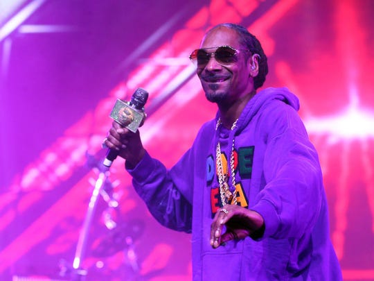 Snoop Dogg performs with Jamiroquai during the 2018