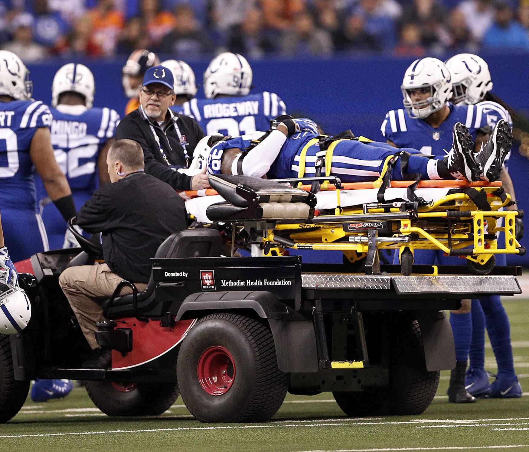 Indianapolis Colts tight end Brandon Williams is tended to by the Colts medical staff in the first half of their game against the Denver Broncos at Lucas Oil Stadium Thursday, Dec 14, 2017.