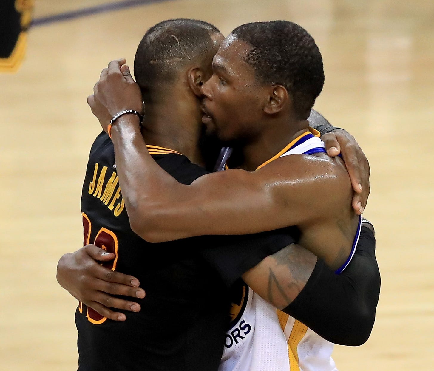 Kevin Durant hugs LeBron James after defeating the Cleveland Cavaliers 129-120 in Game 5 to win the 2017 NBA Finals.