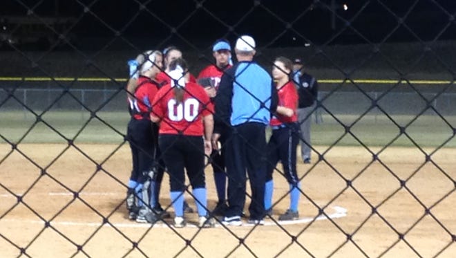 USJ coach Brian Dunn talks with the Lady Bruins during a 2-1 win Friday over Dyer County.