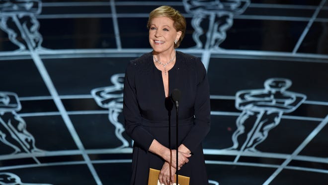 Julie Andrews presents the award for best original score at the Oscars at the Dolby Theatre in Los Angeles. Andrews’ next memoir will tell the back story of “Mary Poppins,” “The Sound of Music” and other beloved works during her years as one of the world’s most popular entertainers. Hachette Books announced Monday, March 23, 2015, that the Oscar-winning actress is working on a follow-up to the 2008 release “Home,” which covers her childhood and early years in show business.