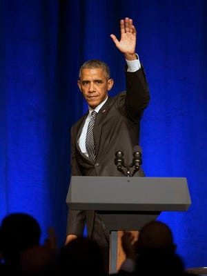 President Barack Obama waves to the crowd after speaking at a Democratic National Committee LGBT fundraising gala, Sunday, Sept. 27, 2015, held at Gotham Hall in New York.