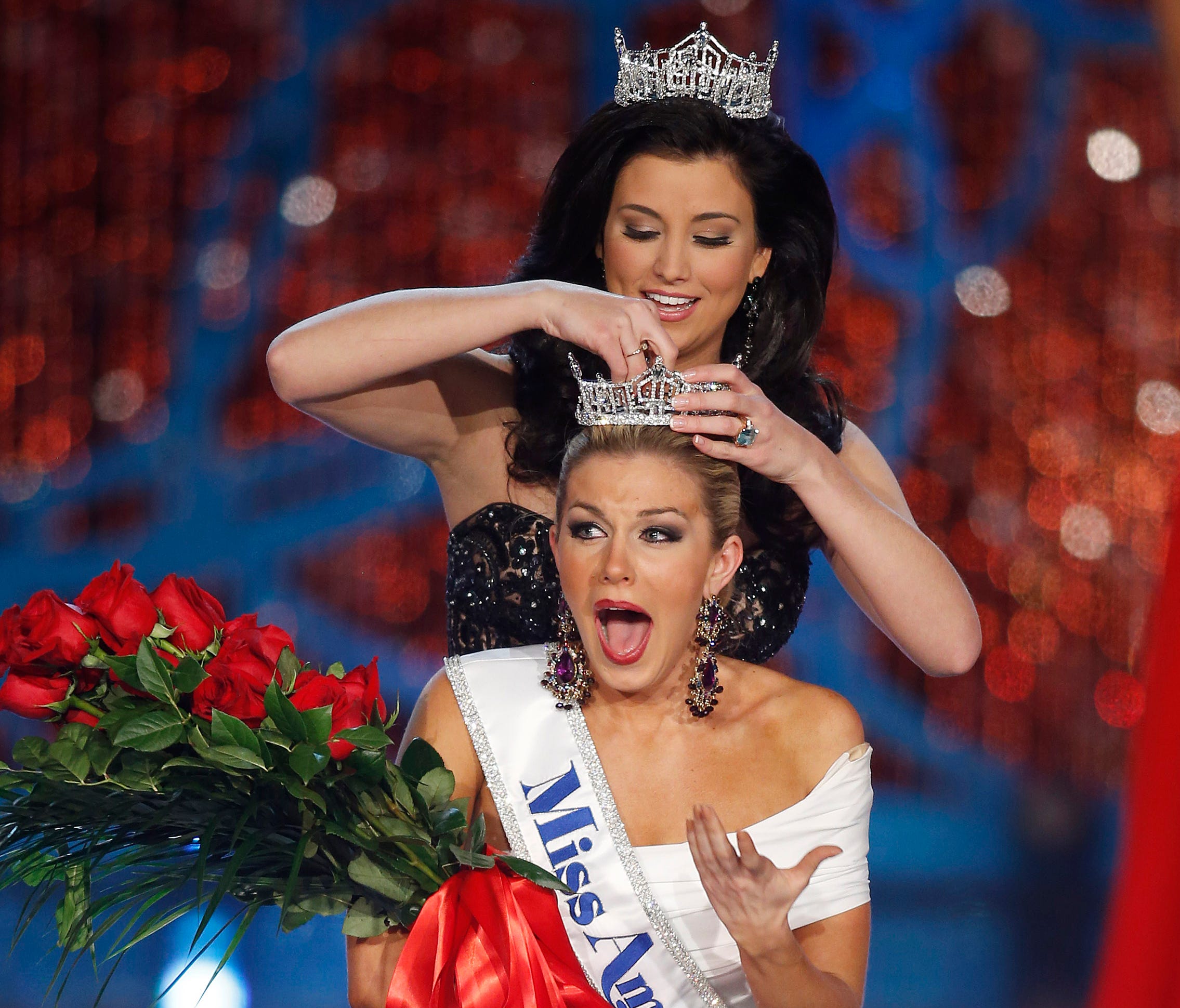 Miss New York Mallory Hagan is crowned Miss America 2013 by Miss America 2012 Laura Kaeppeler on Jan. 12, 2013.
