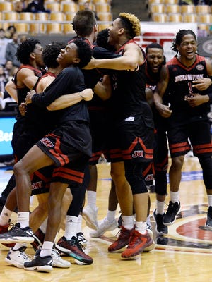 Jacksonville State players celebrate after beating Tennessee-Martin to win the OVC title.