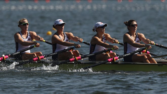 Grace Latz (Jackson), Tracy Eisser, Megan Kalmoe and Adrienne Martelli take to the waters Thursday in the quadruple sculls final.