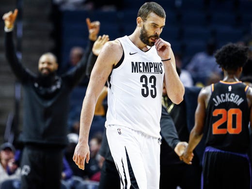 Memphis Grizzlies center Marc Gasol (middle) walks