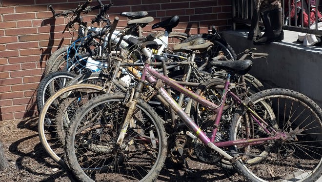 A sample of bicycles pulled out of the Red Cedar River by volunteers during the annual Red Cedar Cleanup is seen on Sunday, April 17, 2016.