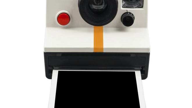 Instant camera and photo