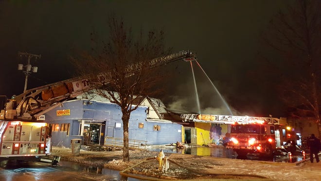 Rochester firefighters battle at two-alarm fire at Shaq Mini Mart at 488 Joseph Avenue.