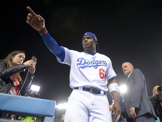 Game 6 at Dodger Stadium: Yasiel Puig celebrates after