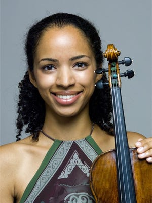 Violinist Anyango Yarbo-Davenport, an Eastman School graduate, won two international competitions at Carnegie Hall in 2010.