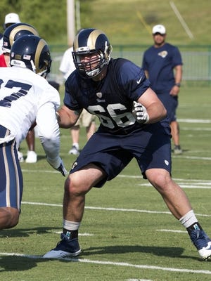 Offensive tackle Mitchell Van Dyk (66) prepares to block during training camp at Rams Park.