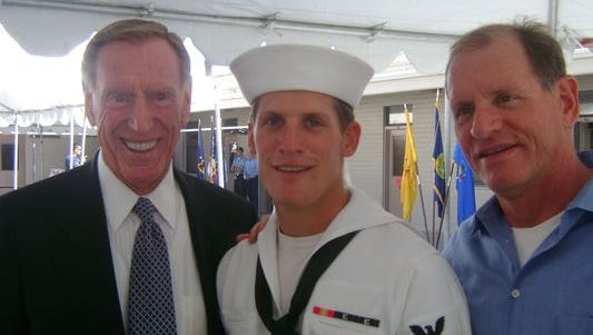 Charlie Keating IV, (center) at his Navy SEAL graduation in 2008, with his grandfather, Charles Keating Jr. (left), and his father, Charles Keating III.