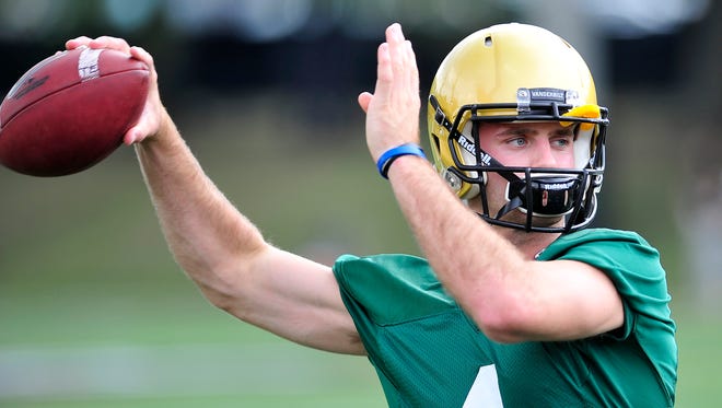 Vanderbilt quarterback Patton Robinette practices during the first day of the training camp in Nashville, Tenn., Thursday, July 31, 2014.