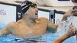 Nathan Adrian celebrates after anchoring the USA to