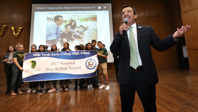 Valle Verde Early College High School Principal Paul Covey celebrates after his school was named a 2017 National Blue Ribbon School by the U.S. Department of Education Thursday.