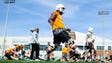 Reginald Kahlil McKenzie Jr. (99)  stretches during