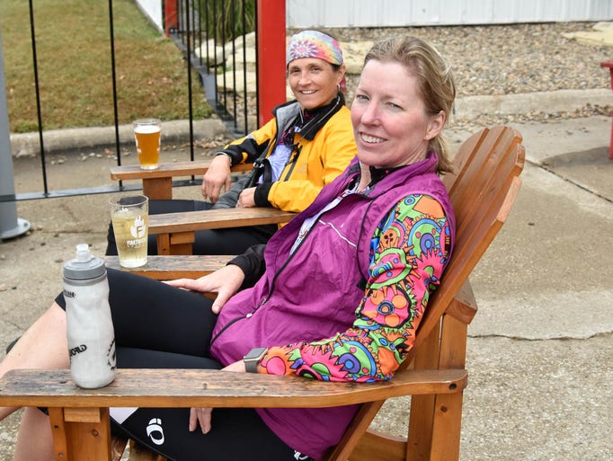 Laura Beebe, 51, of Johnston (foreground), and Laura