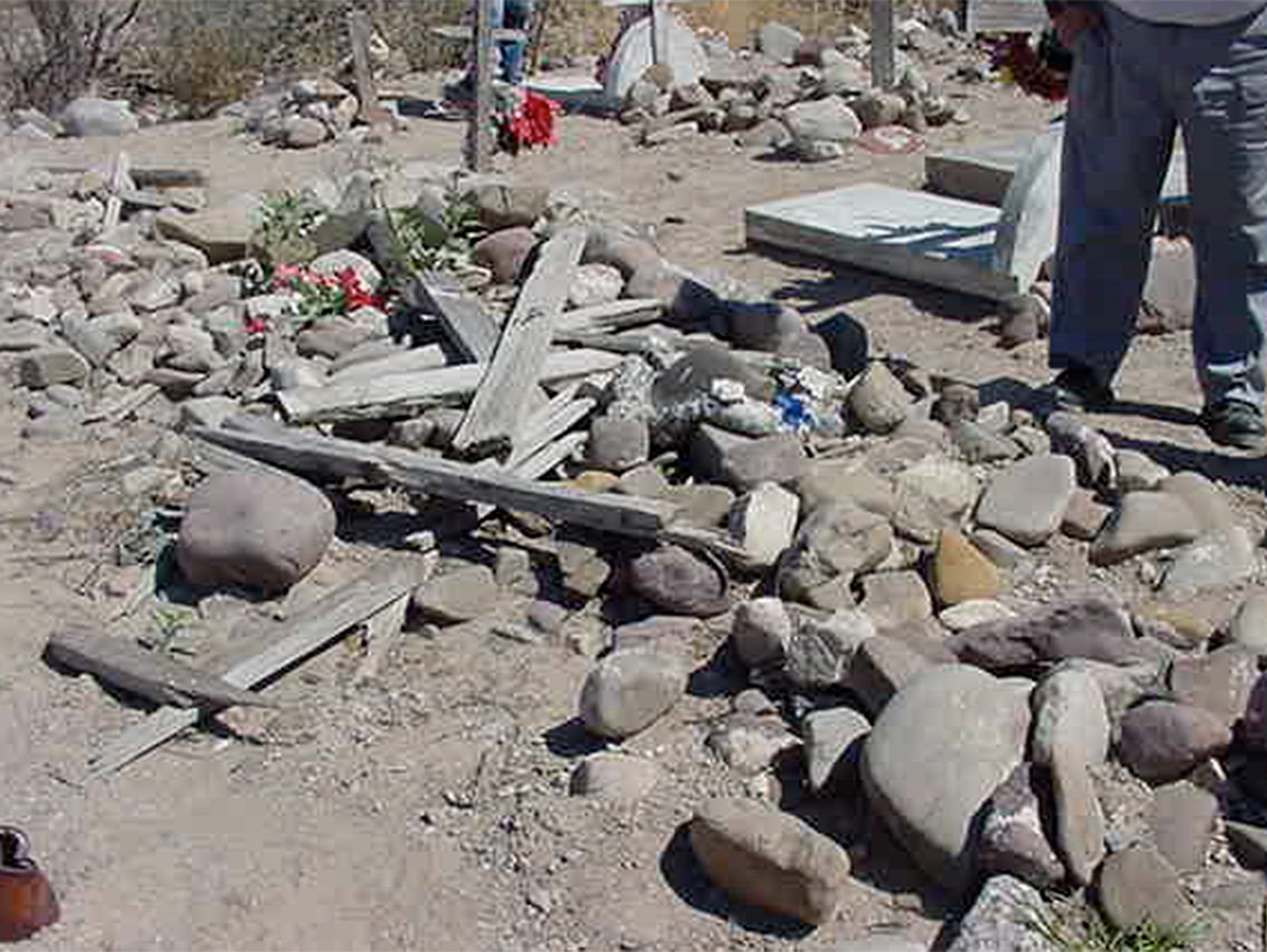 The grave containing the remains of 15 boys and men