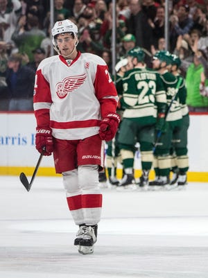 Feb 12, 2017; Saint Paul, MN, USA; Detroit Red Wings forward Dylan Larkin looks on after allowing a goal during the second period against the Minnesota Wild at Xcel Energy Center.