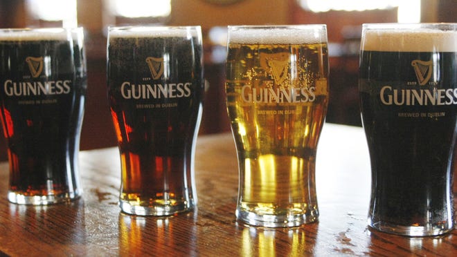 Guinness pints lined up for St. Patrick’s Day celebrations