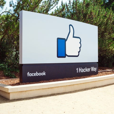 The Facebook like symbol on a sign.