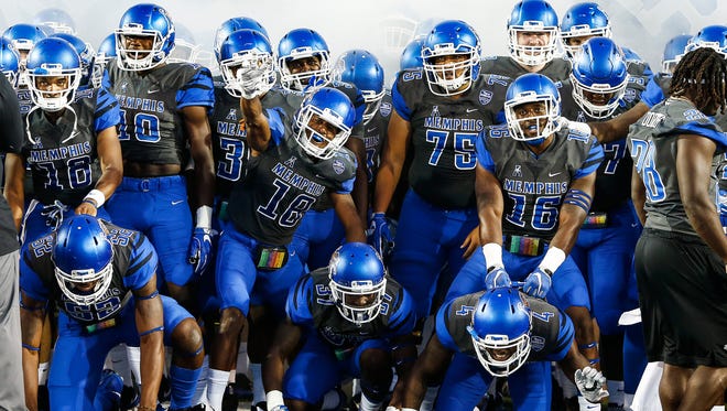 University of Memphis football team prepare to take the field as they take on Southern Illinois University at the Liberty Bowl Memorial Stadium Saturday, September 23, 2017.