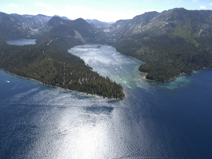 A view of Emerald Bay, from a Robinson R44 Raven 11