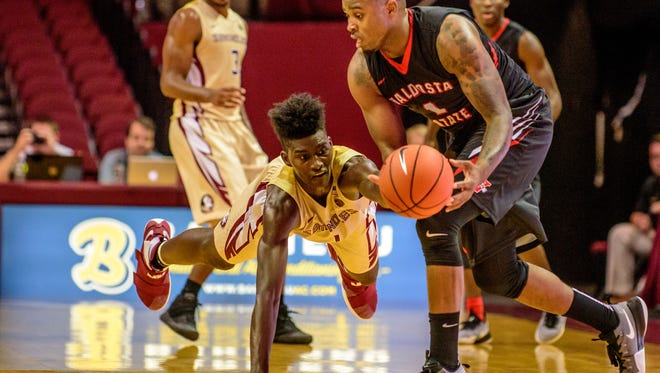 Jonathan Isaac (1) dives to win the ball during the 104-76 Florida State University win against Valdosta State on Thurs., Nov. 03 at the Donald L. Tucker Center in Tallahassee, FL.