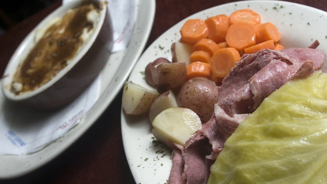 Corn beef and cabbage with potatoes, carrots and a shepherd's pie at Tim Kerwin's Tavern.