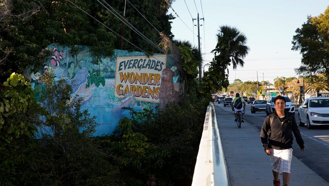 Barber-shave style signs that advertise the Everglades Wonder Gardens dot Old 41 Road in Bonita Springs.