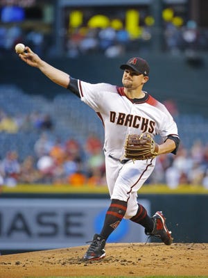 Arizona Diamondbacks starting pitcher Zack Godley (52) throws against the Detroit Tigers in the 3rd  inning of their MLB game Wednesday, May 10, 2017 in Phoenix, Ariz.