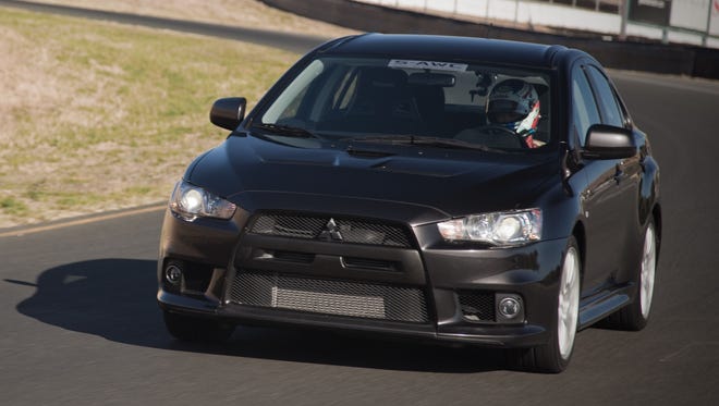 Mitsubishi is recalling nearly 227,000 vehicles in the U.S. to fix glass sunroofs that can fly off and parking brakes that may not work. The first recall covers nearly 57,000 Outlanders from 2007 to 2010, Lancers from 2008 to 2010, Lancer Evolutions from 2009 and 2010, shown, and 2010 Lancer Sportbacks.