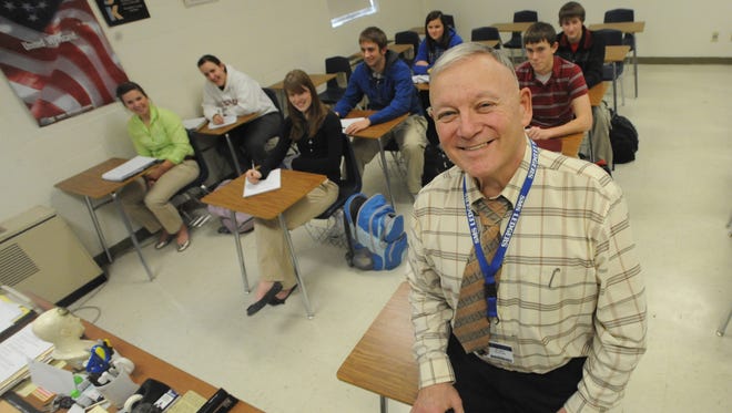 Roger Korinek teaches in class at St. Mary's Springs Academy, 255 County Trunk K, in Fond du Lac, on Feb. 18, 2011.  He retired in 2012.